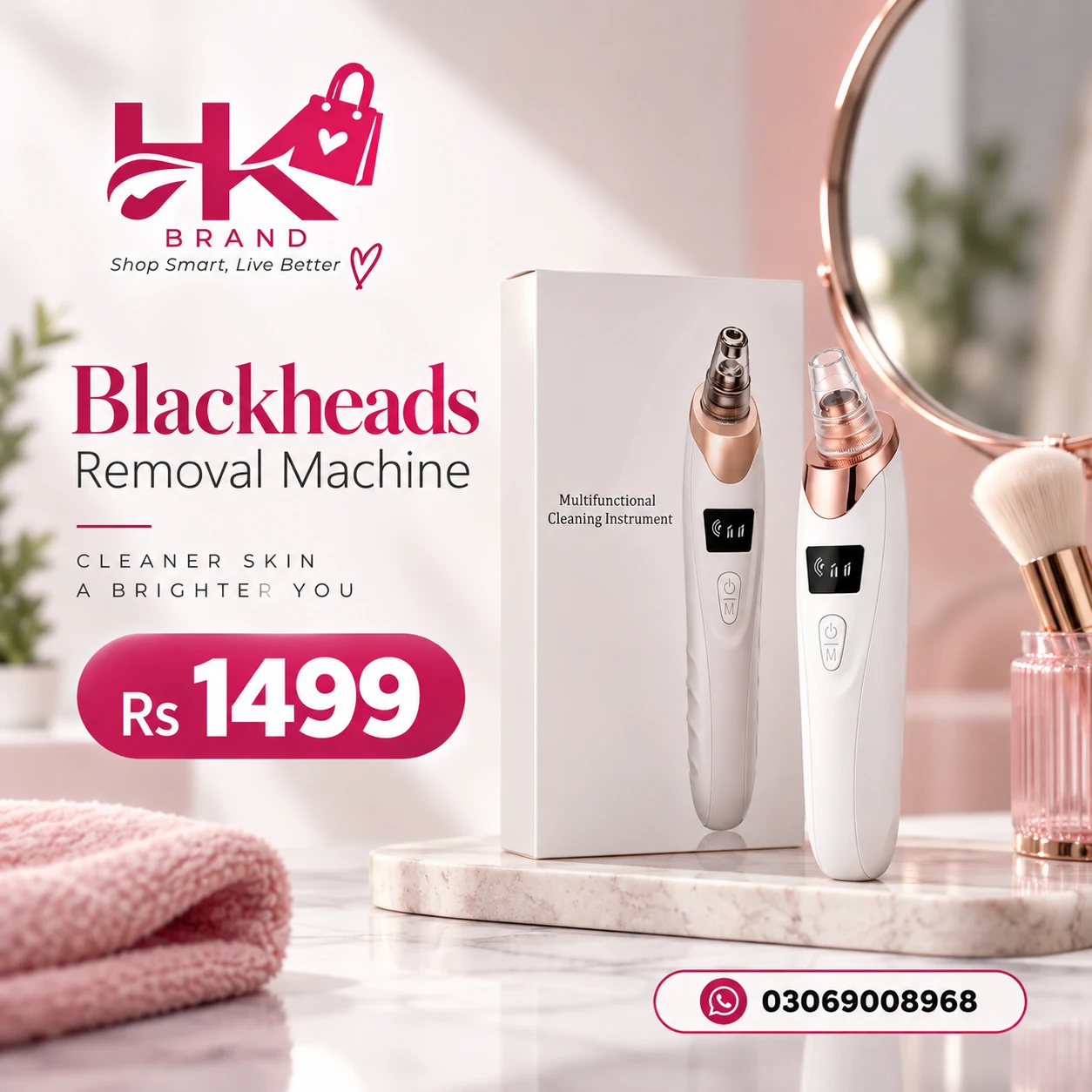 Soft pink HK Brand beauty advertisement with a blackhead removal device and its box on a vanity beside a round mirror and makeup brush.